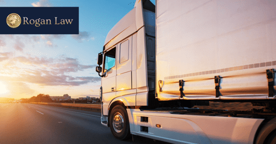 commercial truck on highway during sunset